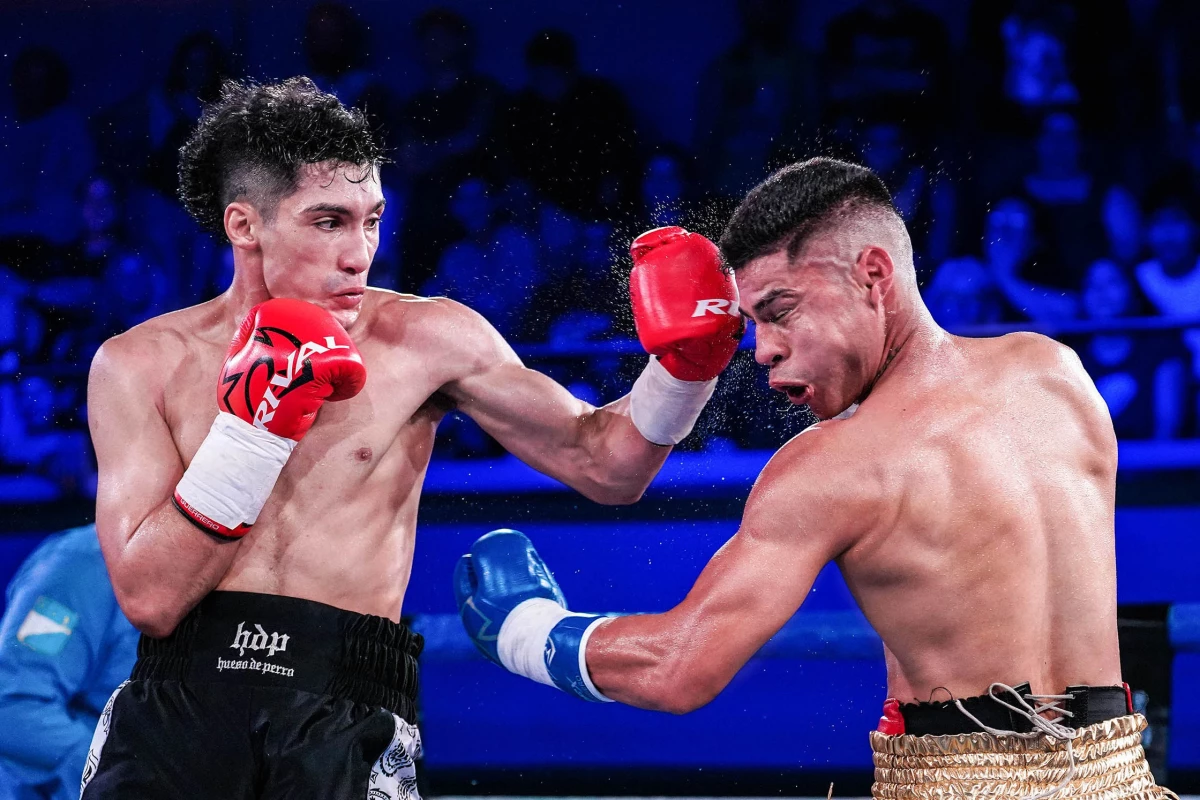 Foto: Victoria por puntos y en fallo unánime de Maximiliano Robledo sobre Alberto Melián, en un gimnasio de la FAB colmado